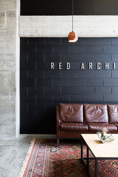 Painted Cinder Block Walls Interiors, Black Painted Cinder Block Wall, Cement Block Wall Painting Ideas, Conduit Interior Design, Painted Cmu Block Wall, Painted Cement Block Walls, Painted Concrete Blocks, Cement Block Wall Ideas, Black Cinder Block Wall