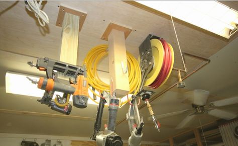 Ceiling Air Compressor Storage Garage Projects, Air Hose Reel, Woodworking Tools Workshop, Garage Tool Storage, Tool Room, Reel Ideas, Garage Organize, Garage Shed, Workshop Design