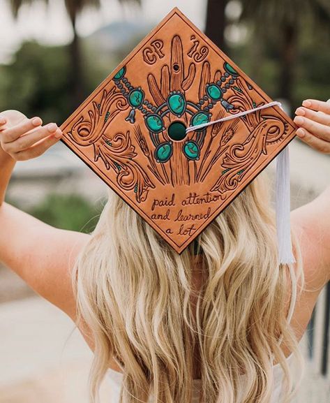 Original tooled grad cap by Magpie West Leather Co. Tooled leather grad cap, western chic, tooled leather, rodeo outfits, western fashion, western chic, leather work, squash blossom, ranch style, cowgirl style, western accessories Leather Grad Cap, Elizabeth Hay, Hygiene School, Western Things, Graduation Cap Decoration Diy, Senior Szn, Grad Shoot, High School Graduation Cap, College Graduation Cap Decoration