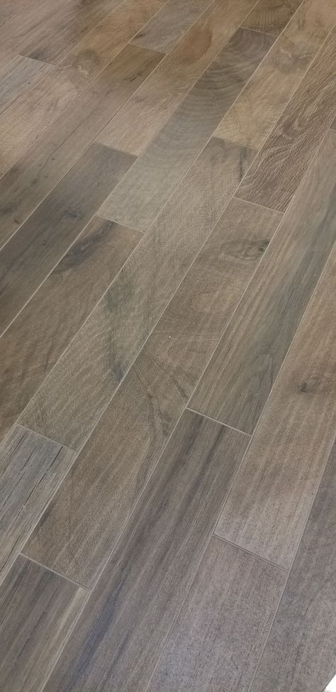 Straight from the showroom floor! One of our favorite wood-look tiles is Woodker Brown. It's the perfect mix of brown, taupe, and gray. . . . #unitedtileco #shoplocal #shreveportremodeling #bossierremodeling #edimax #woodker #brown #woodlooktile #tile #flooring #interior #woodlook #renovationproject #tiles #interiordesign #porcelaintile #design #woodtile #porcelain #ceramics #wood #tileinstallation #bathroomdesign #tilefloor  #grain #natureinspired Wood Tile Floor Whole House, Grey Brown Flooring Kitchen, Brownish Grey Flooring, Brown And Grey Flooring, Gray And Brown Flooring, Woodlook Floor Tiles, Brown Gray Flooring, Taupe Wood Floors, Gray Brown Wood Floors