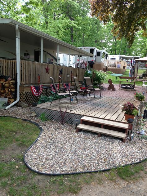 Added additional deck to RV site Trailer Deck Ideas, Animal Crossing Paths, Porch For Camper, Campsite Decorating, Trailer Deck, Adirondack Furniture, Camping Must Haves, Rv Homes, Trailer Living