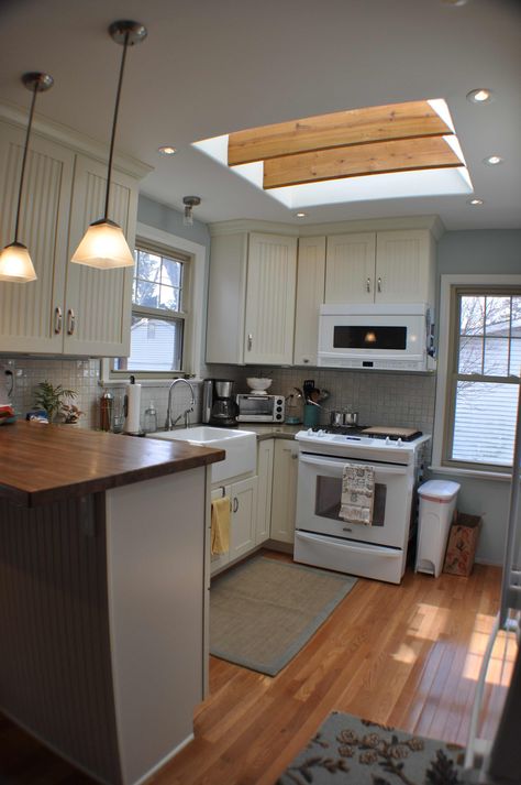 Ahhhhg! My Ceiling heat prevents more overhead lighting and a skylight. I want both. Kitchen With Skylight, Kitchen Skylight, Green Laminate, Skylight Kitchen, Kitchen Layout Plans, Small Kitchen Layouts, Small Kitchen Organization, Small Kitchen Storage, Home Fix