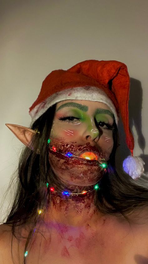 #elf #christmas #horror #horrormakeup #inspo #spooky #makeup #lights Scary Elf Makeup, Horror Christmas Makeup, Spooky Makeup Looks Halloween, Sfx Christmas Makeup, Christmas Horror Makeup, Elf Makeup Looks Halloween, Scary Christmas Makeup, Prison Makeup, Christmas Sfx Makeup