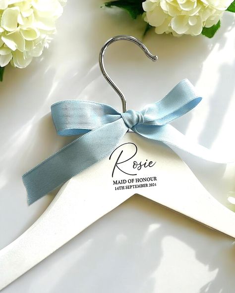 Our hangers are made from pinewood and professionally engraved in house in our studio, hand finished with a satin bow in the colour of your choice 🎀 Perfect for any special occasion and the most amazing keepsake designed to last! 🤗 SHOP VIA LINK IN OUR BIO 🛒 #bridesmaidhangers #bridalhanger #weddingdecor #weddingrobes #bridetobe #bridetobe2022 #bridetobe2023 #bridetobe2024 #weddinginspiration #weddingdetails #weddingkeepsake #weddingkeepsakes #weddingkeepsakegift #weddinggift #weddinggift... Bridesmaid Hangers, Bridal Hangers, Wedding Keepsakes, Satin Bow, The Colour, Keepsake Gift, Maid Of Honor, Wedding Details, Hangers