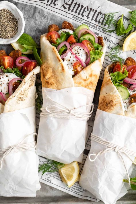 Easy Vegan Tempeh Gyros | Jessica in the Kitchen Tempeh Wrap Recipes, Greek Wrap Vegetarian, Pita Bread Wraps, Gyros Photography, Vegan Gyro Recipe, Gyros Vegetarian, Gyro Photography, Tempeh Gyros, Pita Wrap Recipe