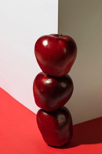 Free Photo | Stack of red apples next to corner Apple Reference Photo, Red Apple Aesthetic, Apple Reference, Apple Photoshoot, Half An Apple, Apple Aesthetic, Apple Photography, Apples Photography, Apple Photo