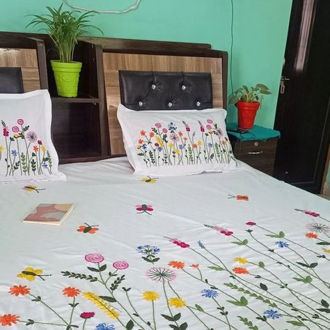 Dcushioncover Cushion on Instagram: "Beautiful hand embroidered customized bed cover 1+2 😍😍  Give ur house a traditional touch with this beautiful hand embroidered bedcover or can be gifted to  who loves the handmade or hand embroidered products  Material -cotton fabric  Size - king size 108*108"  16*27" size pillow cover    White base color  Product care instructions  ❤ wash with mild detergent ❤wash it with hands  ❤dry in shade   ❌machine wash  All our handlooms  needs our care😀😀  Customisation of color and size available  Dm us for order 😀😀  #dcushioncover #embroiderydesign  #embroideryhoop  #embroidery  #embroideryart #smallbusiness #handembroidered  #handmade  #instagram  #reels" Handmade Bed Sheets, Embroidered Sheets, Embroidered Products, Bed Cover Design, Easy Dress Sewing Patterns, Cushion Embroidery, Hand Embroidered Pillows, Embroidered Bedding, Pillow Embroidery