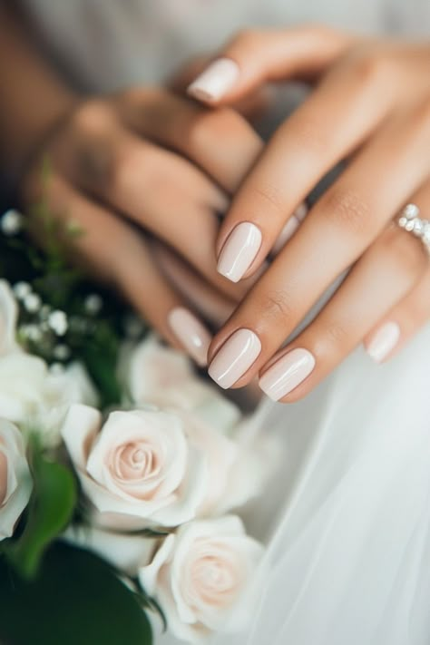 Hands with manicured nails holding a bouquet of white roses. Wedding Nails Solid Color, Light Wedding Nails, Gel Nail Wedding Designs, Elopement Wedding Nails, Plain Bridal Nails, Bridal Nails Square Shape, Blush Nails For Wedding, Pedicure Bride Wedding, Ombre Bride Nails