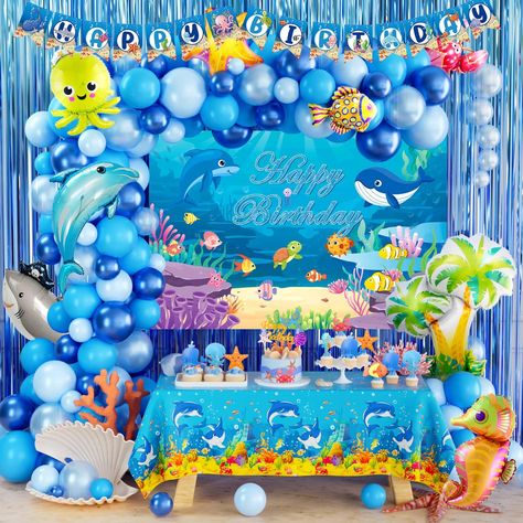 PRICES MAY VARY. 🌊 TAKE A DIVE UNDER THE SEA – Loot at this gorgeous Under the Sea birthday party decorations! The blue fringe curtains in this kit create an underwater wonderland vibe. Featuring with large marine animal foil balloons, as if you are actually in the ocean. Splish, splash. Take a dive and enjoy this ocean carnival! 🐙 UNDER THE SEA PARTY DECORATIONS INCLUDES - 45 x 12’’ latex balloons | 15 x 12’’ metallic balloons | 20 x 5’’ latex balloons | 5 x 5’’ metallic balloons | 9 x foil b Halloween Wagon, Ocean Themed Birthday Party, Sea Birthday Party Decorations, Party Decorations Backdrop, Under The Sea Party Decorations, Backdrop Fringe, Sea Party Decorations, Underwater Wonderland, Baby Birthday Party Theme