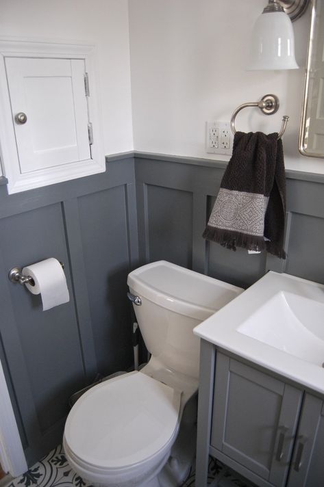 Small white bathroom renovation update with grey wainscoting and laundry shoot Grey Wainscoting, Small White Bathroom, Laundry Shoot, Small White Bathrooms, Wainscoting Kitchen, Kid Bathroom, Wainscoting Bedroom, Beadboard Bathroom, Wainscoting Bathroom