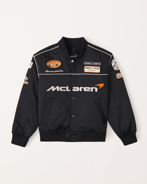 Classic bomber jacket in a soft wind- and water-resistant nylon fabric and relaxed-fit silhouette, featuring McLaren-inspired graphic patch details throughout, side pockets, snap-up front, ribbed collar and elastic cuffs and waistband. F1 Jacket Mclaren, Mclaren F1 Jacket, Mclaren Jacket, American Jacket, Wag Dr, Boys Coats, Hollister Jacket, Marvel Dr, Joe Burrow