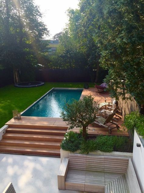 Sunken Pool Area: If you can't fully bury the pool, you can create a sunken seating area near the pool. Lower the surrounding yard or patio area to the same level as the pool, creating the impression that the pool is at ground level.

Hashtags for Above-Ground Pool Ideas:
#AboveGroundPool
#BackyardPool
#IngroundPoolLook
#LuxuryBackyard
#PoolDeckDesign
#PoolTransformation Best Above Ground Pool Ideas, Swimming Pools Backyard Above Ground, Pools Backyard Above Ground, Sunken Pool, Dip Pool, Sunken Seating Area, Sunken Seating, Sunken Trampoline, Dipping Pool