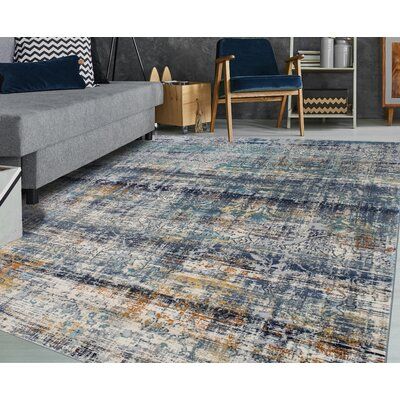 Introducing the ultimate blend of style and functionality - the high-low Ziebarth Abstract Blue area rug that is sure to elevate your home decor to new heights! With its gorgeous blend of colors, including blue, teal, aqua, rust, and silver, this rug is the perfect accent piece to bring a touch of elegance to any room. Crafted from high-quality polyester and polypropylene, this rug is designed to withstand the demands of everyday life. With its stain-resistant properties, it can withstand spills Blue Couches, Abstract Area Rug, Blue Area Rug, Blue Area, Blue Ivory, Cotton Pillow, Online Home Decor Stores, Blue Rug, Bungalow Rose