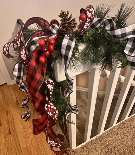 Christmas Evergreen  and Ribbon garland in Buffalo Plaid.  - You will have the option of purchasing this garland in 3' , 6' , 9' , & 12' - You will also have the option of adding lights to the garland. The lights will be white lights. Please let me know if you would like battery powered or plug in lights.  - Decorate your door or your mantel with this festive garland.  - Shipping included in the price Decorate Garland For Christmas, Rustic Garland Christmas Decor, Red And Black Buffalo Plaid Christmas, Buffalo Plaid Garland, Banister Garland, Plug In Lights, Lodge Christmas, Festive Garland, Christmas Outdoors