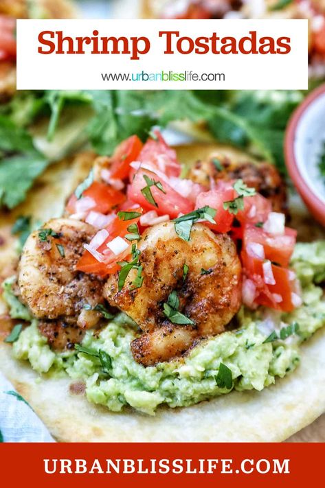 These Shrimp Tostadas are full of flavor and easy to make for lunch or dinner. With fluffy flour tortillas, a creamy homemade guacamole, bright pico de gallo, and well seasoned shrimp, these are great for Cinco de Mayo, summer picnics and BBQs, and any weeknight dinner. Get the recipe at UrbanBlissLife.com. Shrimp Tostadas Mexican, Summer Shrimp Dinner, Shrimp Tostada, Shrimp Guacamole, Tostada Recipe, Summer Shrimp Recipes, Shrimp Tostadas, Creamy Guacamole, Taco Mac And Cheese