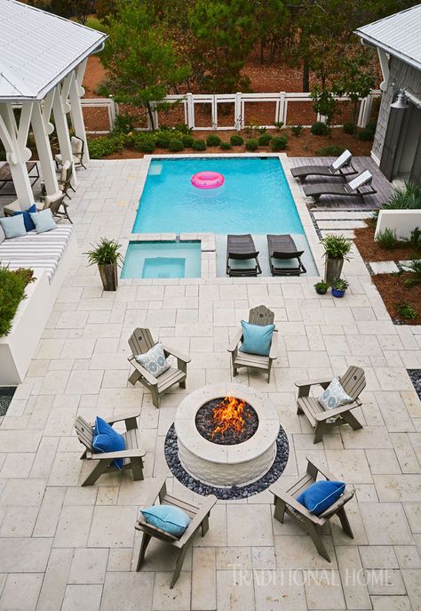 Even the fire pit manages to be nautically-inspired with the seaside chairs and blue cushions in this beautiful backyard. Via Traditional Home Kleiner Pool Design, Backyard Pool Design, Small Pool Design, Backyard Pool Landscaping, Small Pools, Dream Pools, Outdoor Decorating, Backyard Pool Designs, Swimming Pools Backyard