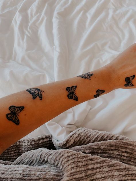 Sleeve Of Butterflies Tattoo, Butterfly Tattoos Going Up The Arm, Up The Arm Tattoos For Women, Wrap Around Forearm Tattoo Women Butterflies, Butterflies Around Wrist Tattoo, Butterfly Forearm Tattoo Half Sleeves, Forarm Butterflies Tattoo, Butterfly Up Arm Tattoo, Scattered Butterfly Tattoo