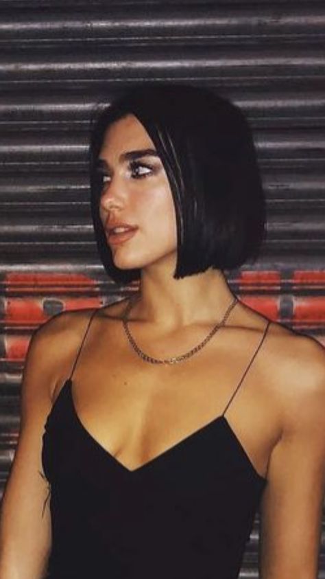 Sleek Black Bob, Dua Lipa Short Hair Bob, Dua Lipa Bob Haircut, Chin Length Black Hair, Short Bob Dark Hair, Lopsided Bob, Dua Lipa Short Hair, Jet Black Short Hair, Jet Black Bob