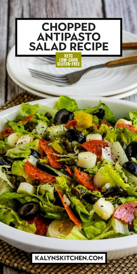 Chopped Antipasto Salad shown in serving bowl with plates and forks in back. Chop Salad Recipes, Antipasta Salads, Wilted Salad, Side Dish Salad, Antipasto Salad Recipe, Crab Pasta Salad, Amazing Salads, Italian Salad Recipes, Keto Salad