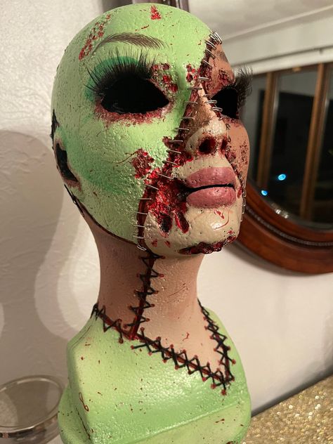 Styrofoam mannequin head painted to look like a patchwork skin mask Scary Manikin Head, Halloween Styrofoam Head, Halloween Maniquin Head Cosmetology, Mannequin Halloween Ideas, Styrofoam Head Halloween, Halloween Mannequin Head Ideas, Halloween Mannequin Ideas, Styrofoam Head Ideas, Sfx Makeup Prosthetic