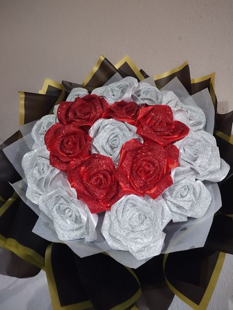 A handmade bouquet of red and white roses with added glitter. It is unique in its design. There is the possibility of adding more details to the bouquets, but that will incur an additional cost. If you have any questions or concerns, you can contact me without problem. Rose Glitter Bouquet, Red Eternal Bouquet, Red Rose Flower Buke, Red Glitter Roses Bouquet, Red And Silver Flower Bouquet, Red And White Bouquet, White And Red Flowers, Roses Bouquet Gift, Handmade Bouquet