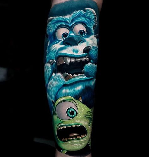 Mike & Sulley from the movie Monsters, Inc. Tattoo by Eigleer Nunes, an artist based in Miami, Florida. Monsters Ink Tattoo, Sulley Tattoo, Monsters Inc Tattoo Ideas, Complex Tattoos, Monsters Inc Tattoo, Universal Monsters Tattoo, Upper Arm Tattoos For Guys, Colourful Tattoo, Owl Tattoo Chest