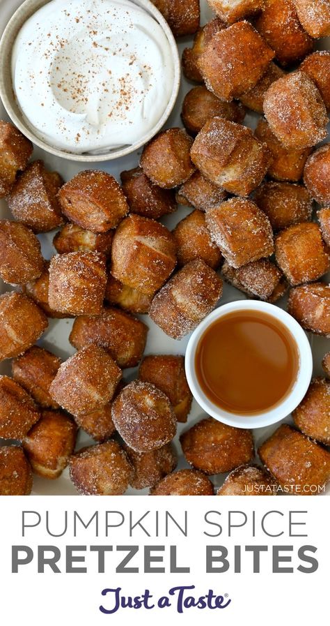 A close-up view of pumpkin spice pretzel bites surrounding two small bowls containing whipped cream and caramel sauce. Pumpkin Spice Pretzel Bites, Pumpkin Spice Appetizers, Pumpkin Soft Pretzels, Pumpkin Spice Pretzels Recipe, Pumpkin Spice Pretzels, Pumpkin Spice Snacks, Stuffed Pretzel Recipe, Pumpkin Pretzels Recipe, Fall Pretzels