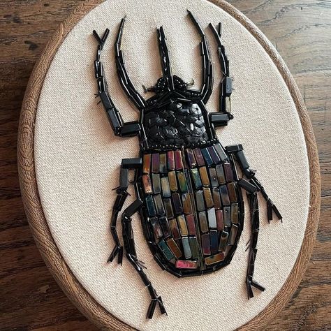 Sarah Leonard on Instagram: "Rhino beetle 🪲 🦏 Featuring hidden water colour, beading, sequins and hand embroidery." Beetle Embroidery Pattern, Embroidery Beetle, Beetle Embroidery, Beetle Cross Stitch, Beaded Beetle, Embroidered Beetle, Mixed Media Embroidery, Beatle Insect Embroidery, Bugs Embroidery Insects