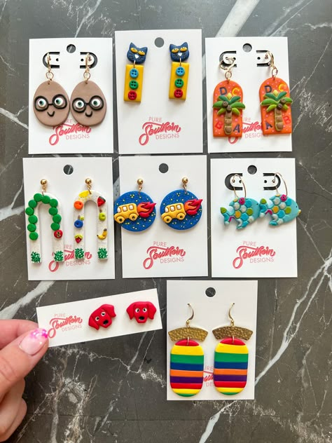 *PRE-ORDERS can take up to 1-2 weeks to make.  *Every earring is handmade with love by me. Each piece is designed, created, mixed, sanded, and assembled in my home. They are made from polymer clay, which is lightweight and a fun way to spice up your outfits. Since each piece is one of a kind there may be some variations/imperfections within the colors and/or shape (each creation may differ slightly from the photos). *All earrings are made with nickel free/hypoallergenic backings and/or findings. *How to clean clay: use a cotton swab with acetone. *How to clean brass: use Brasso and ketchup. *How to store: in a cool, clean, dry area. *Avoid: water, bending, perfumes, etc. Bookish Earrings, Book Clay Earrings, Teacher Earrings Clay, What To Make Out Of Clay, Funky Clay Earrings, Earrings Handmade Clay, Polymer Clay Earring Ideas, Book Earrings, Diy Earrings Polymer Clay