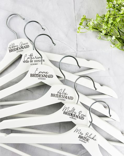 Your wedding day is a once in a lifetime moment and we have the perfect touch to make it even more unforgettable. These are our dreamy white coated timber coat hangers. They are a beautiful photography prop but they also make a thoughtful keepsake for your bridal party so everyone can cherish your special day for years to come. They are really easy to personalise and order and with next business day dispatch there is no stress - all the hard work is done for you. Explore our personalised wedd... Unique Bridal Party Gifts, Wedding Coat Hangers, Best Groomsmen Gifts, Couple Gifts For Her, Personalized Hangers, Wedding Tumblers, Wedding Coat, Car Lover Gifts, Personalized Wedding Decor