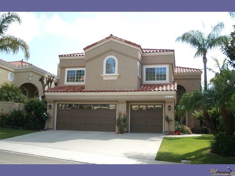 Red roof, cream windows, trim, gutters, brown garage.  House color: taupe? Beige House Exterior Red Roof, Cream House With Brown Roof, Exterior House Colors With Red Tile Roof, House With Red Brown Roof, White Stucco House Brown Roof, Terracotta Roof House Exterior Colors, Exterior Siding Colors, Exterior Paint Schemes, Tan House