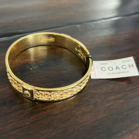 Nwt Coach Gold Bangle Dream Items, Dope Jewelry Accessories, Initial Charm Bracelet, Expensive Jewelry Luxury, Coach Jewelry, Jewelry Aesthetic, Enamel Bangle, Buckle Bracelet, Jewelry Luxury