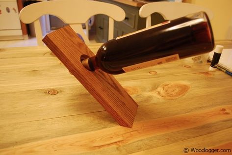 Wine Bottle Stand - WoodLogger Bottle Holder Diy, Wine Bottle Holder Diy, Woodworking Bookshelf, Wine Bottle Stand, Wine Rack Plans, Industrial Style Lamps, Built In Wine Rack, Woodworking Plans Pdf, Bookshelf Plans