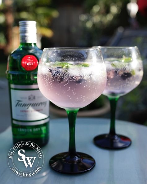 My Blueberry Gin and Tonic Recipe is a perfect drink for any event or just a really good evening when you're after a fruit G&T. This easy fresh fruit gin and tonic is the perfect party drink and is also an easy party cocktail. This fresh blueberry gin and tonic made with Tanqueray gin will be an easy cocktail you make time and time again. An easy Tanqueray cocktail to be enjoyed all year round. Blueberry Cocktails, Gin And Tonic Recipe, Gin Tonic Recipe, Gin Drink Recipes, White Recipes, Blueberry Cocktail, Blueberry Gin, Tanqueray Gin, Tonic Recipe