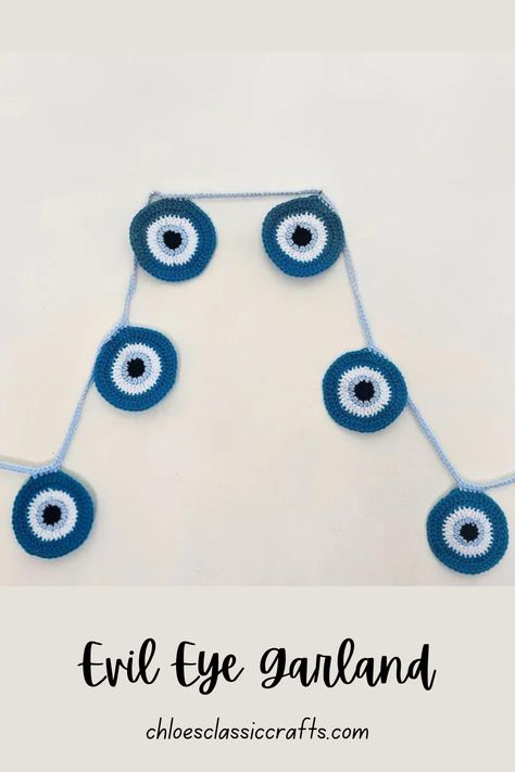 At Chloesclassiccrafts.com Add Mystical Charm to Your Space with Handmade Evil Eye Garlands from Chloe's Crafts! Elevate your decor with these unique, protective talismans. Shop now and ward off negativity in style! #EvilEyeGarland #ChloesCrafts #DecorWithMeaning #UniqueTalismans #ShopNow Evil Eye Crochet Pattern Free, Free Evil Eye Crochet Pattern, Crochet Evil Eye Pillow, Crochet Evil Eye Car Hanging, Crochet Evil Eye Dream Catcher, Evil Eye Crochet, Crochet Evil Eye, Crochet Room, Keychain Pattern