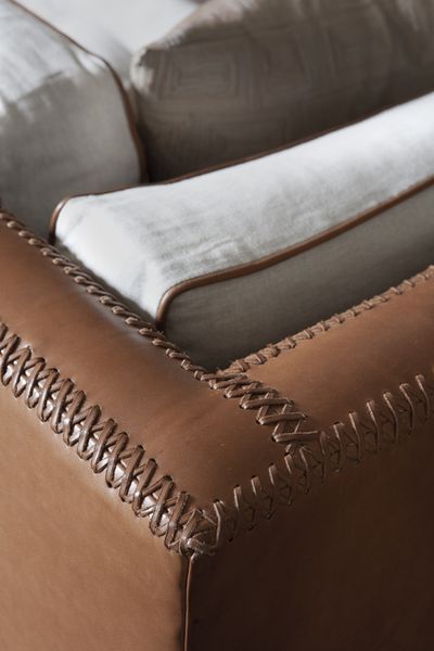 This baseball stitching is one of my favorite details on the sofa. It's the Black’s Beach sofa by Tim Clarke, made of leather, linen and brushed steel. Beach Sofa, Baseball Stitching, Baseball Stitch, Joinery Details, Upholstery Diy, Modern Upholstery, Leather Couch, Furniture Details, Furniture Upholstery