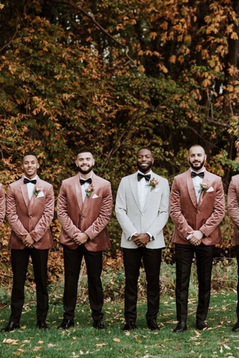 Groomsmen in crushed velvet pink jackets with black bow ties with groom in light grey suit and black bow ties Blush Groomsmen Attire, Blush Colour Scheme, Pink Wedding Color Palette, Blush Groomsmen, Blush Pink And Black Wedding, Groom With Groomsmen, Light Grey Suit, Wedding Playlist Reception, Terracotta Blush