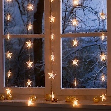 Dishfunctional Designs: A Colorful Bohemian Glow in Winter Fairy Lights Ikea, Christmas Window Decoration, Christmas Window Lights, Winter Living Room, Starry String Lights, Minimalist Candles, Bohemian Christmas, Starry Lights, Winter Window