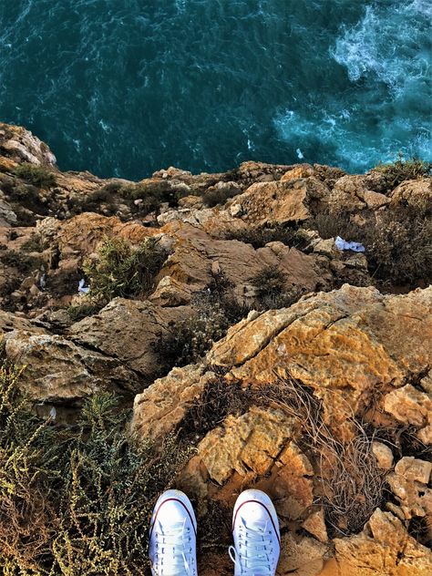 #Travel #Cliff #Sky #Clouds #Nature #Edge #Europe #Trip #Life #Wallpaper #wpp #Joy #iPhone7 #Portugal #Converse #ShotoniPhone Cliff Edge Aesthetic, Edge Of Cliff Aesthetic, Cliff Aesthetic, Script Base, Edge Of Cliff, Two Oceans Meet, Hd Carlton, Monster Flavors, Ocean Cliff