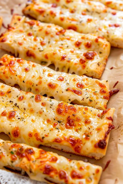 Whip up these heavenly Garlic Parmesan Breadsticks in no time! Featuring a delightful mix of aromatic garlic and rich cheeses atop a homemade dough, these breadsticks are the perfect addition to any meal. They're golden, cheesy, and have that irresistible pull-apart goodness. Ideal for parties or a family dinner, they're sure to impress. Don’t forget to pin this recipe for an easy go-to that’s both delicious and satisfying. Try them tonight! Homemade Garlic Fingers Recipe, Easy Garlic Breadsticks Recipe, Easy Cheesy Bread Recipes, Garlic Fingers Recipe, Cheesy Breadsticks Pizza Dough, Breadsticks With Pizza Dough, Pepperoni Breadsticks, Garlic Parmesan Breadsticks, Parmesan Breadsticks