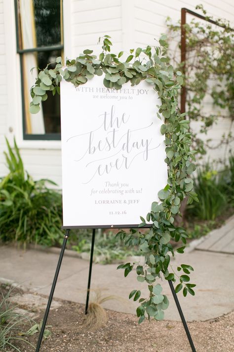 Janeane Marie Photography captured this shot of the welcome sign at Barr Mansion complete with greenery by Stems Floral! #heavenlydayevents #weddingcoordination #austinweddingcoordinator #barrmansion #jeananemariephotography #stemsfloral #detailshot #welcomesign #greenery Greenery On Welcome Sign, Welcome Sign Wedding Greenery, Wedding Bales, Bridal Shower Arrangements, Wedding Sign Greenery, Wedding Chalk, Oak Tree Wedding, Dyi Wedding, Barr Mansion