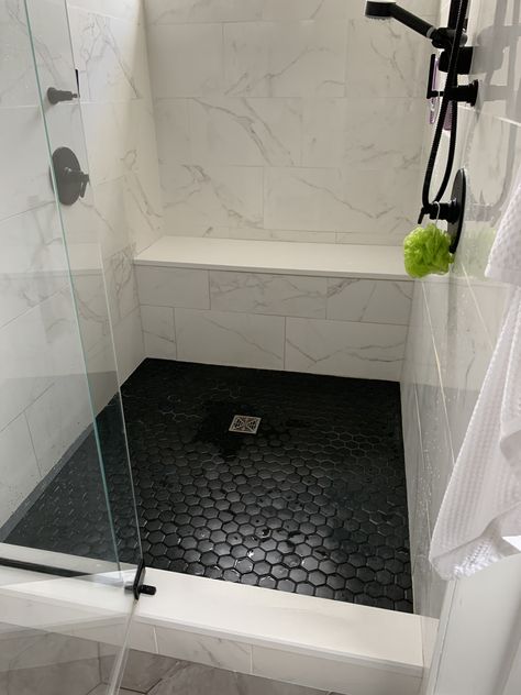 White Wall Black Floor Bathroom, Gray And Black Shower Tile Ideas, Black Floor Shower Ideas, Master Bath With Black Tile, Bathroom Tile Ideas Marble, Contrasting Bathroom Tiles, Dark Tiled Bathrooms, Dark Bathroom Floor Ideas, Bathroom Ideas With Black Tile