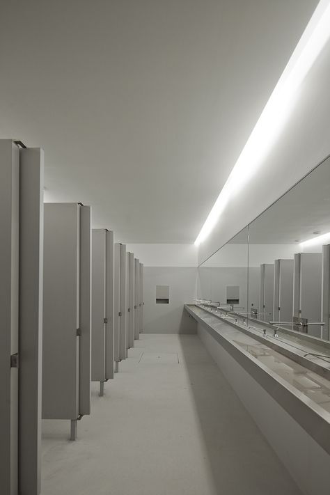 Image 12 of 28 from gallery of Lamego Multi Purpose Pavillion / Barbosa &amp; Guimarães. Photograph by Jose Campos Public Restroom Design, School Restroom, Commercial Bathroom Designs, School Building Design, Wc Design, School Bathroom, Restroom Design, School Hallways, School Interior