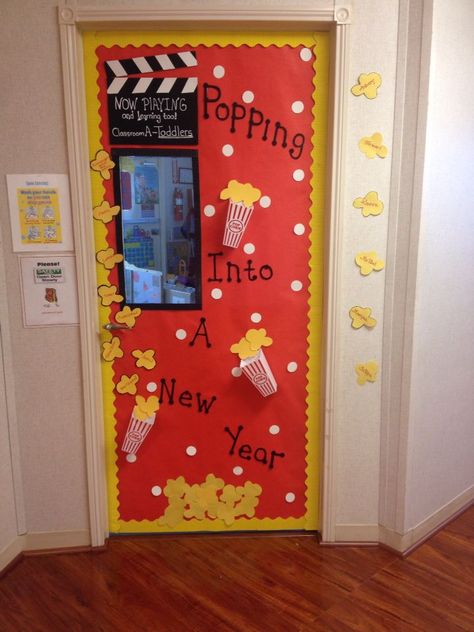 Popcorn classroom door January Holiday Door Decorations For Daycare, Classroom Door Ideas For January, New Years Preschool Door Ideas, 2024 Classroom Door, January Daycare Door Ideas, Winter Preschool Door Ideas, New Year Door Decorations Classroom, New Year Door Decorations For School, January Door Ideas For Classroom