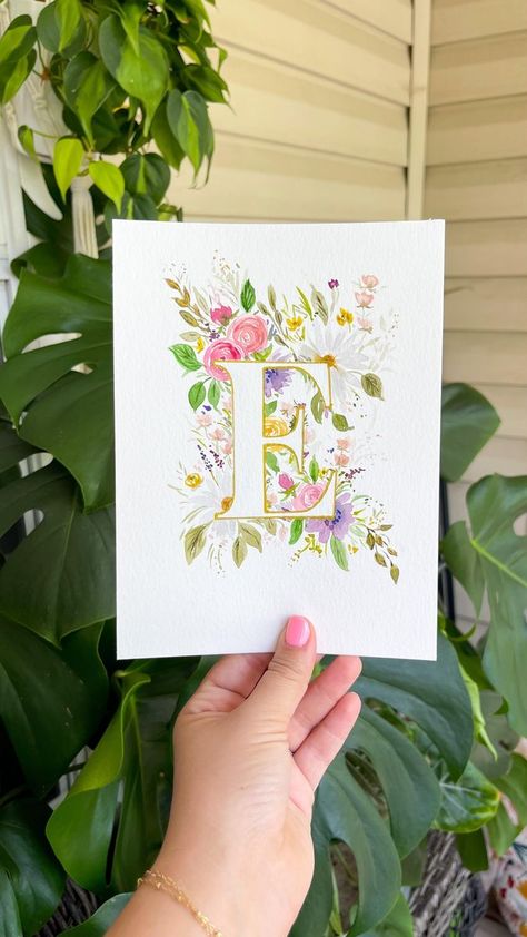 Where are all my people whose name start with an “E” ?! 🤗 I can’t take credit and say this song was chosen intentionally, but it’s very fitting! “For Emma” 🥰 @princetonbrush velvet touch round size 4 brush @cansonpaper xl @pebeo masking fluid Quniballco signo gold pen Stencils and supplies are linked in my profile #watercolorflowers #monogram #arttherapy #watercolorpainting #negativespace | februaryrosedesigns | Bon Iver · For Emma Emma Name Art, Illuminated Initials, Gold Pen, Bon Iver, Watercolor Flower Art, My People, Watercolor Flower, Name Art, Watercolor Cards