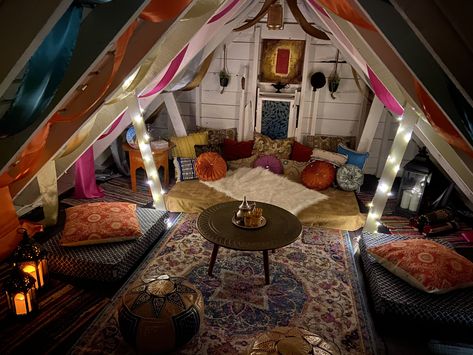 Turning the other half in the attic to Moroccan sitting area Chill Attic Room, Bohemian Attic Bedroom, Cute Attic Hangout Ideas, Attic Den Ideas, Boho Hangout Room, Floor Hangout Area, Bedroom Hangout Area, Triangle Roof Room Ideas, Yoga Attic Space