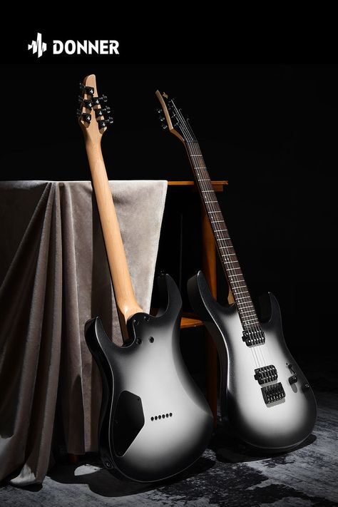 The DMT-100 electric guitar is launched in a new Gradient Black color. It uses H-H high-output pickups, which can perfectly interpret the heavy rock style. The three-stage switching pickup control system combined with the volume knob creates a powerful rock tone and meets the performance needs of a wide range of music styles. Electric Guitar Collection, Electric Guitar Metal, Hayloft Electric Guitar, Electric Guitar Left Handed, Electric Guitar Kits, Guitar Kits, Heavy Rock, Danelectro Bass Guitar, Guitar For Beginners