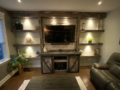 My husband did this Rustic Wall Units For Tv Living Rooms, Rustic Entertainment Wall, Rustic Tv Wall Ideas Mounted Tv, Rustic Tv Wall Ideas, Entertainment Center Ideas Diy, Tv Shows Quotes, Tv Entertainment Wall, Tv Console Decorating, Built In Tv Wall Unit