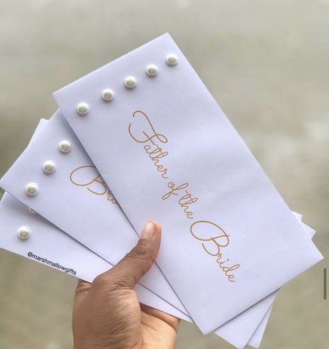 White envelopes bejewelled with white pearls for engagement dowry wrapping. Dowry Wrapping Ghana, Traditional African Wedding, Ghana Traditional Wedding, Pearl Theme, Engagement Gift Baskets, Bridesmaid Get Ready Outfit, Pretty Gift Wrapping Ideas, Classic Weddings, Ghana Wedding