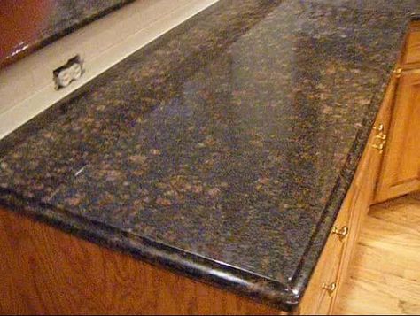 Tan Brown Granite Countertops | http://www.fireplacecarolina.com Kitchens With Saudi Brown Granite Countertops, Baltic Brown Granite Kitchen, Tiles Countertop, Baltic Brown Granite Countertops, Fireplace Granite, Backsplash Brown Granite, Tan Brown Granite, Black Granite Tile, Dark Brown Kitchen